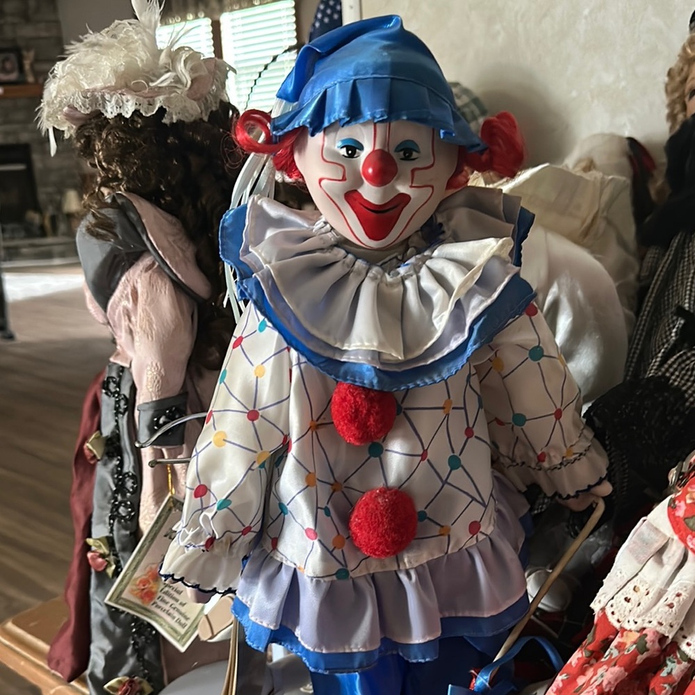 Colorful Clown Doll with Blue and Red Accents